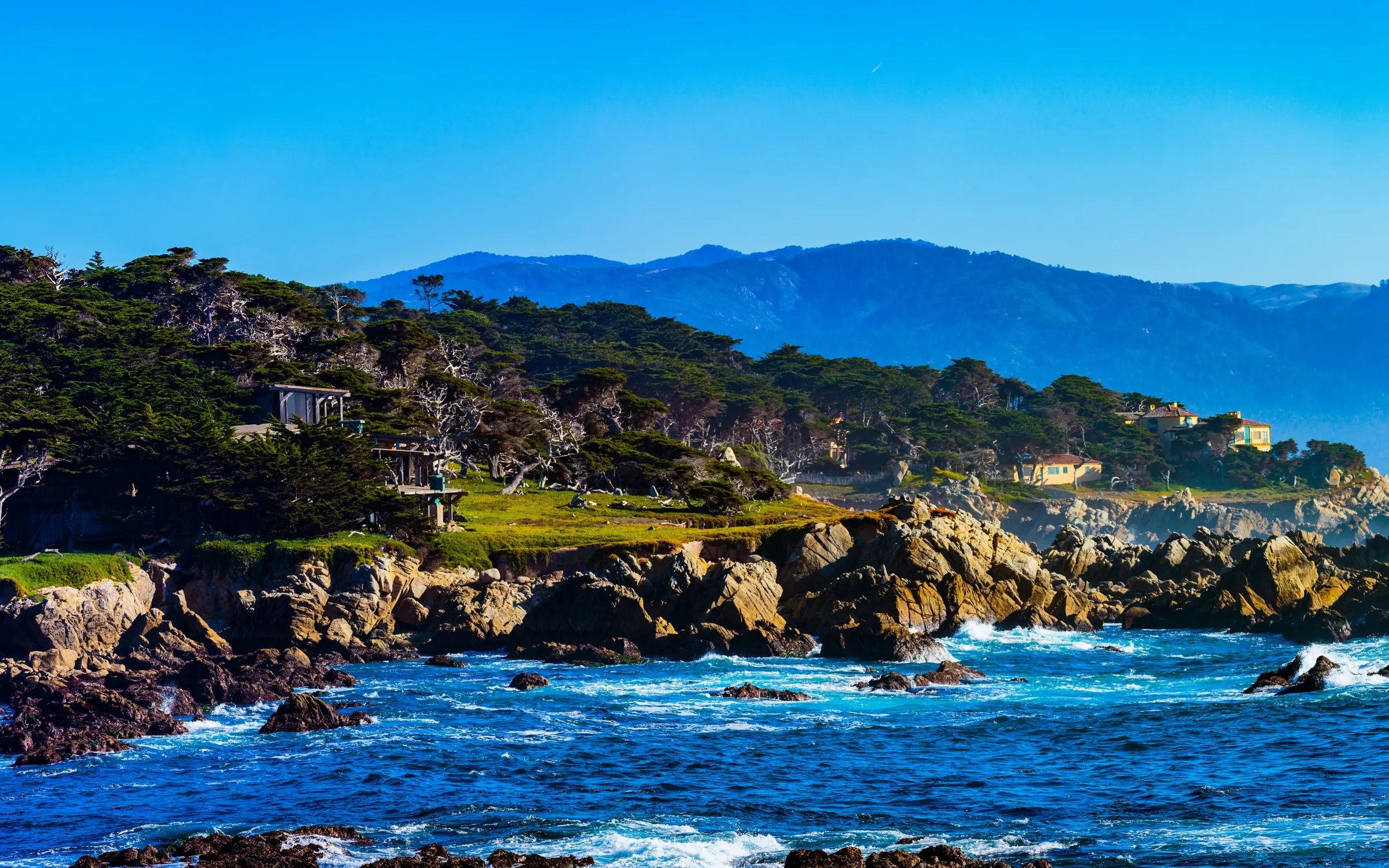 Rocky coastal vista near Pebble Beach overlooking the Pacific Ocean and the 17-Mile Drive shoreline.